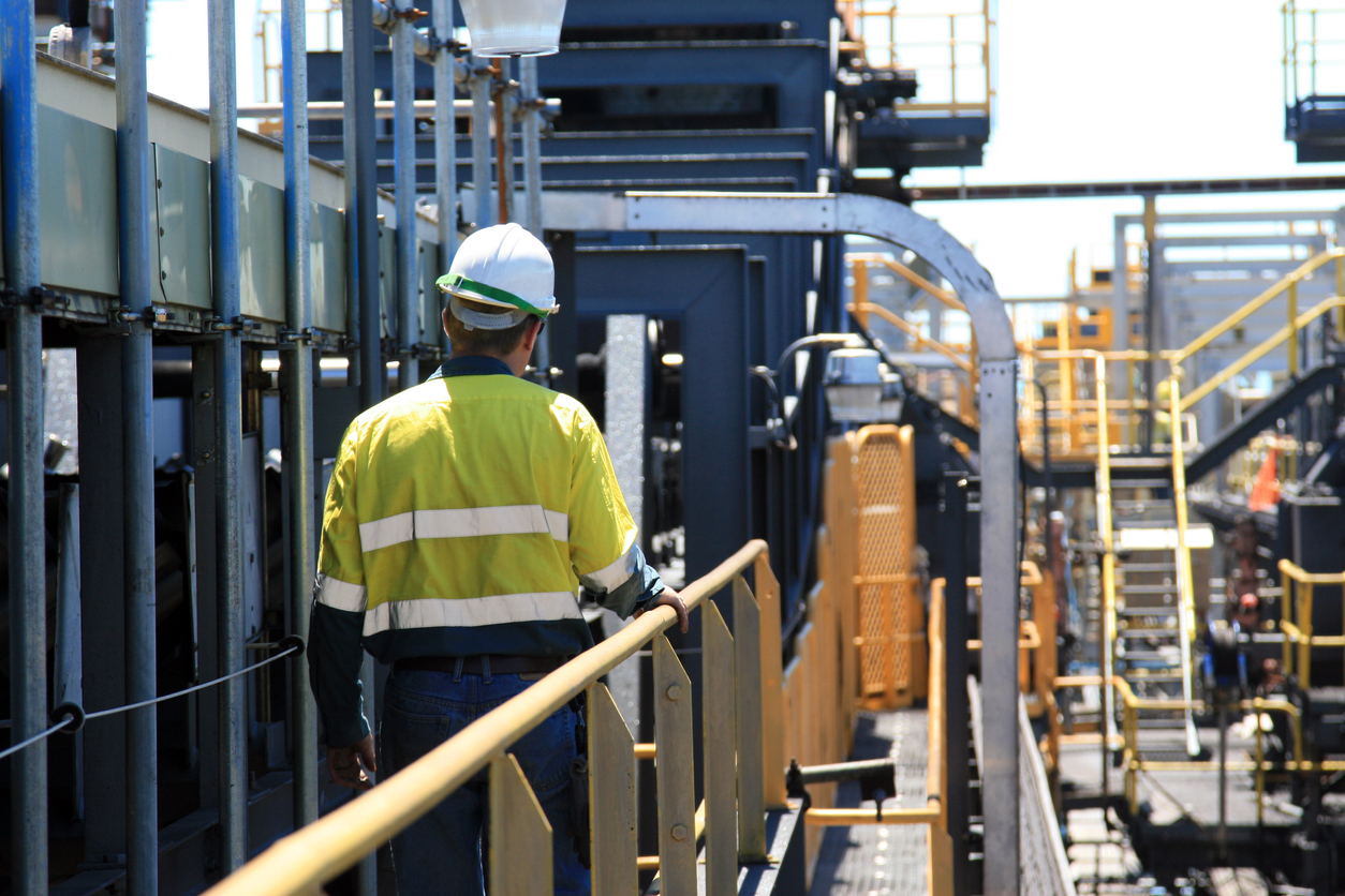 man in hi vis on job site