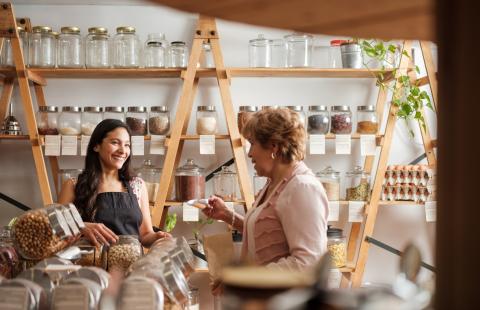 Happy employee with customer