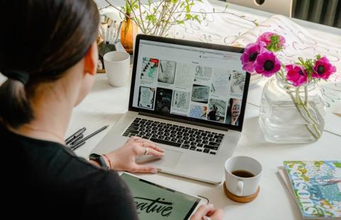 woman typing on computer