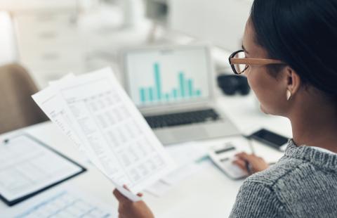 woman looking over her finances